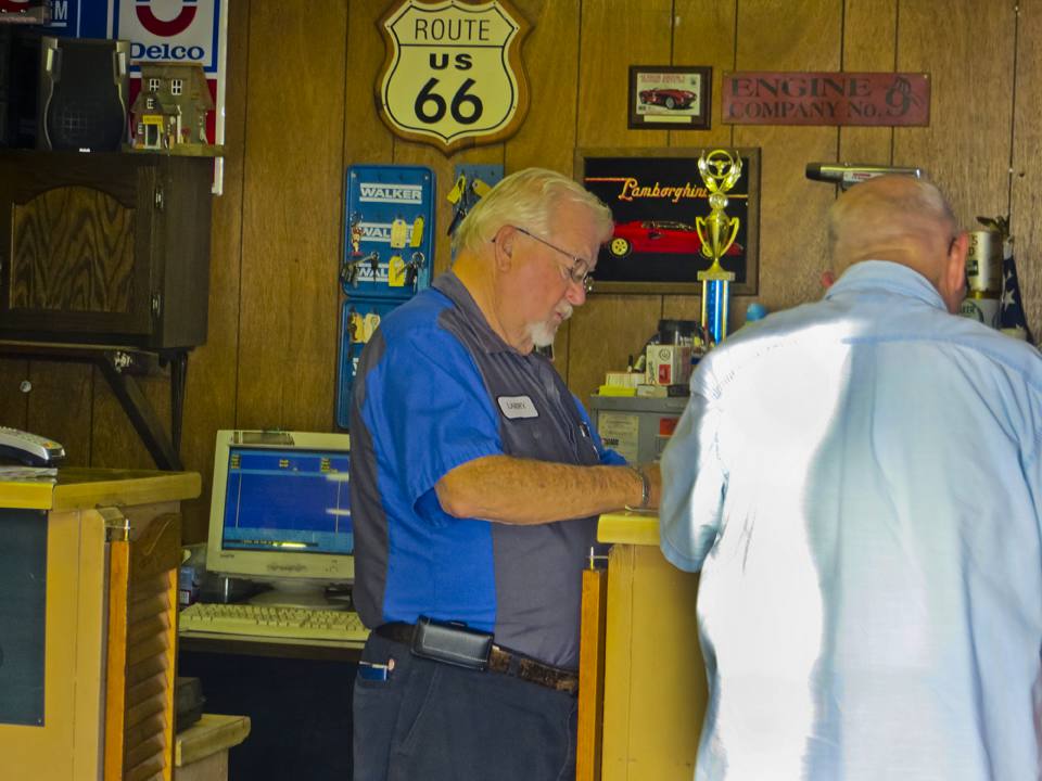 Larry Burrell with customer